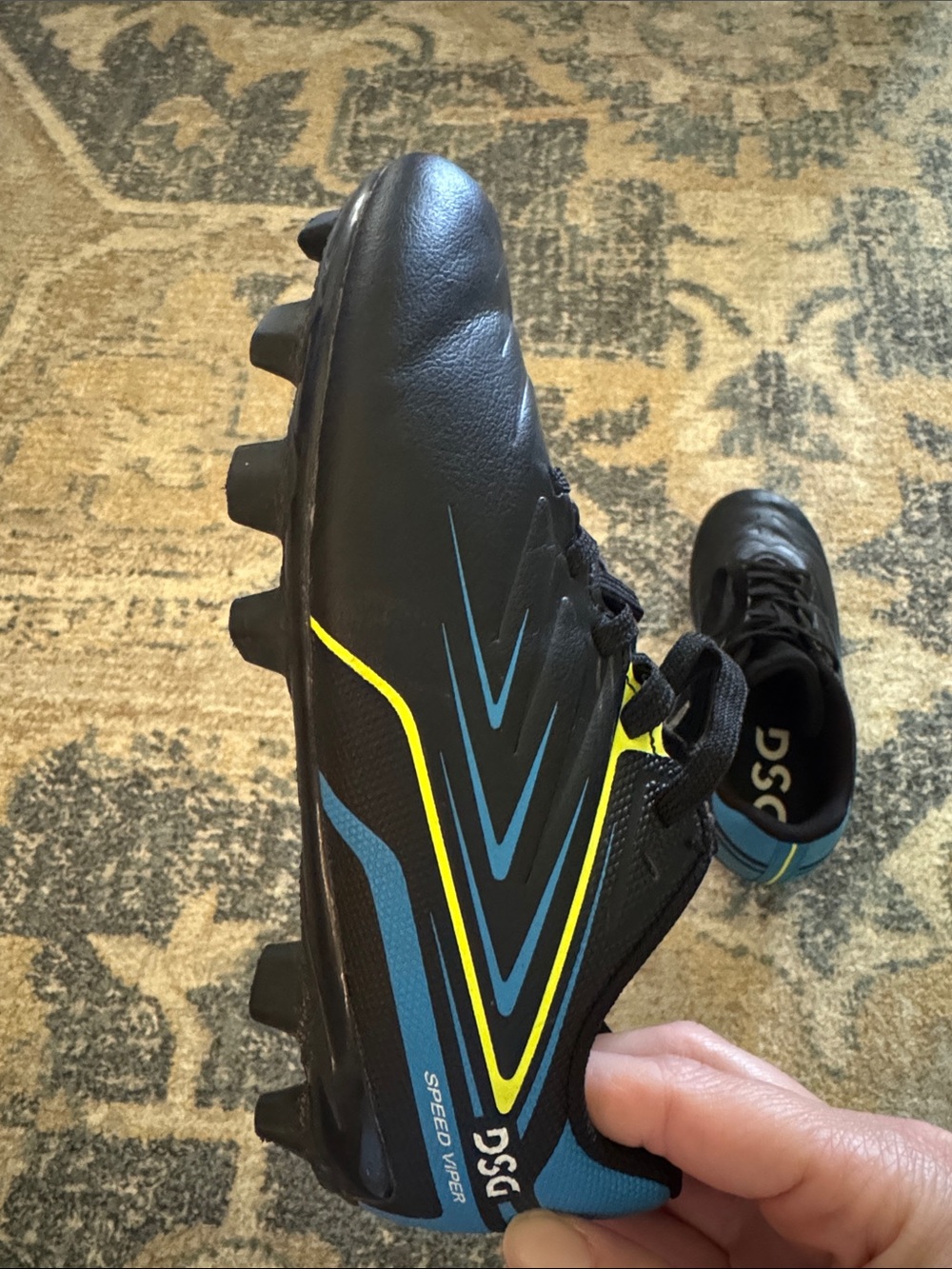 DSG Black Youth Athletic Cleats with Blue and Yellow Accents